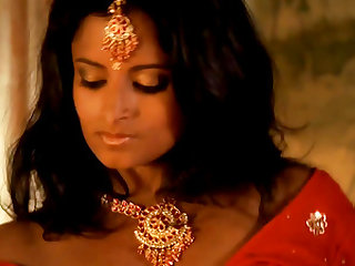 Alluring brunette Kathak plays with a snake and her naked curves