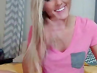 Busty blonde with big round tits teasing and fingering her pink pussy